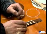Changer les cordes d'une guitare classique