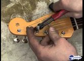 Changer les cordes d'une guitare électrique type Stratocaster