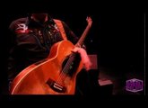 Tommy Emmanuel Whacks a Heil Sound PR35 Microphone
