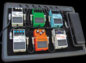 Pedal order, powering, and securing effects to the pedalboard