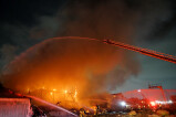 Un entrepôt de Boutique Amps Distribution détruit par les flammes