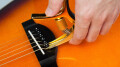 Guitto sort un capodastre multifonction